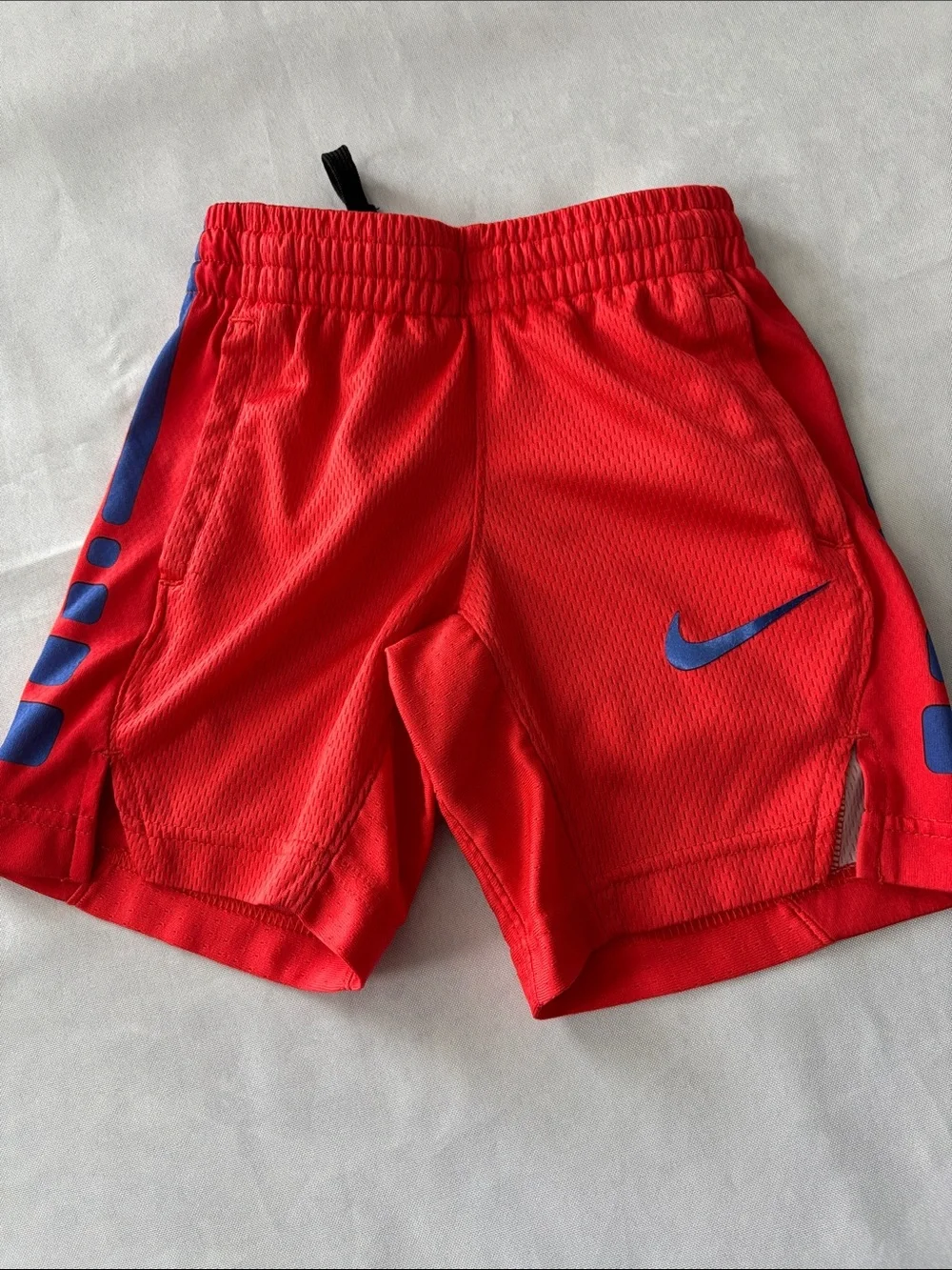 Nike Red Kids Athletic Shorts with Blue Logo and Side Panels size XS